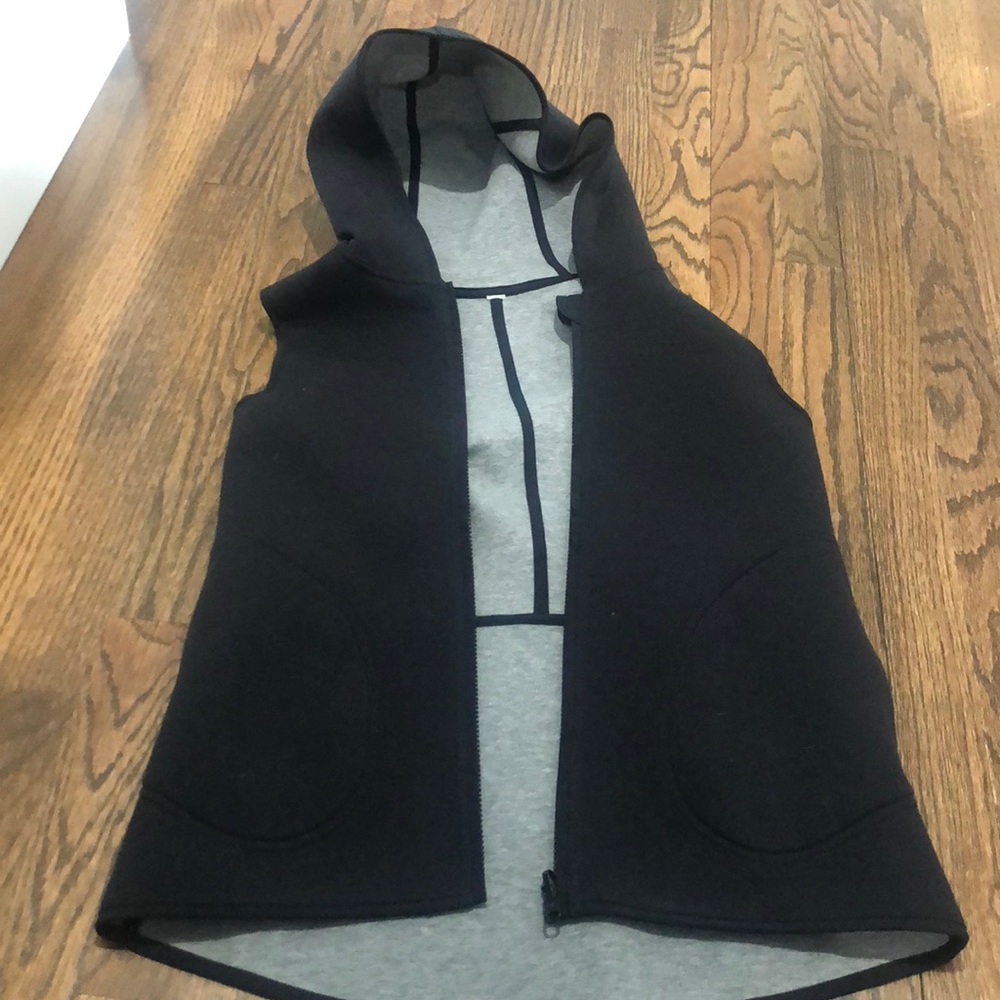 Reversible vest with hoodie